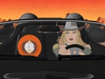 Кенни с девушкой в авто